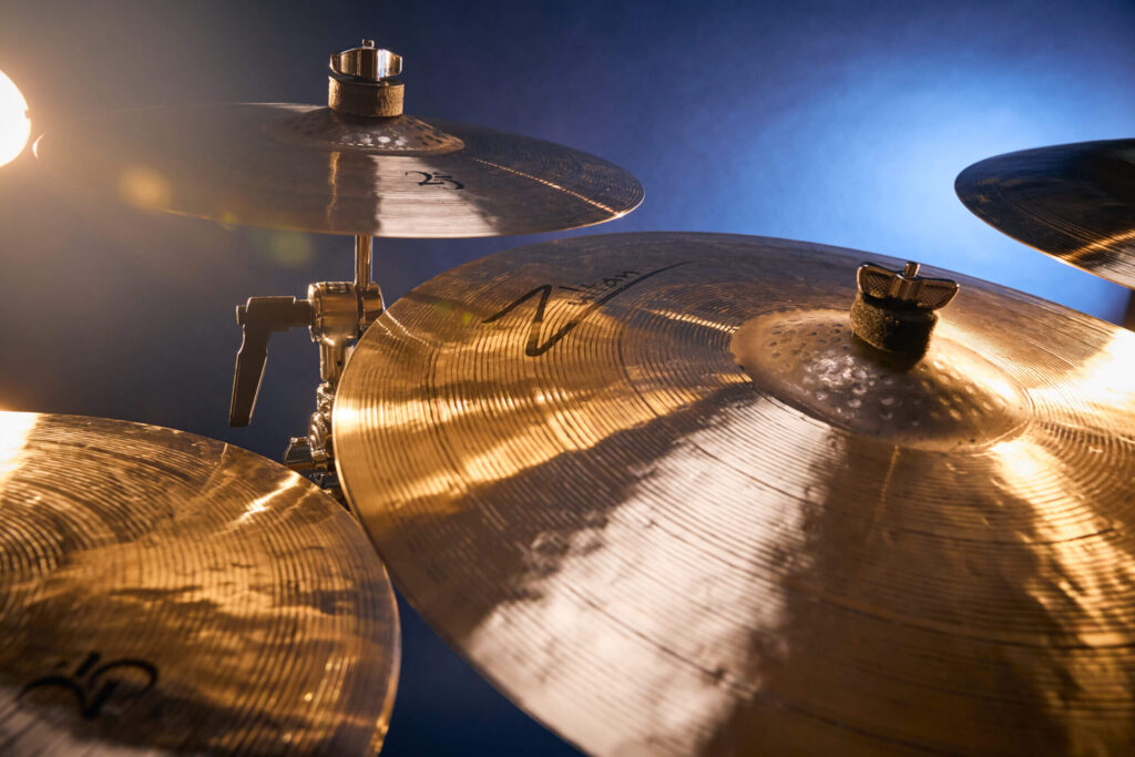 Close-up of 25 anniversary series drums with moody lighting.